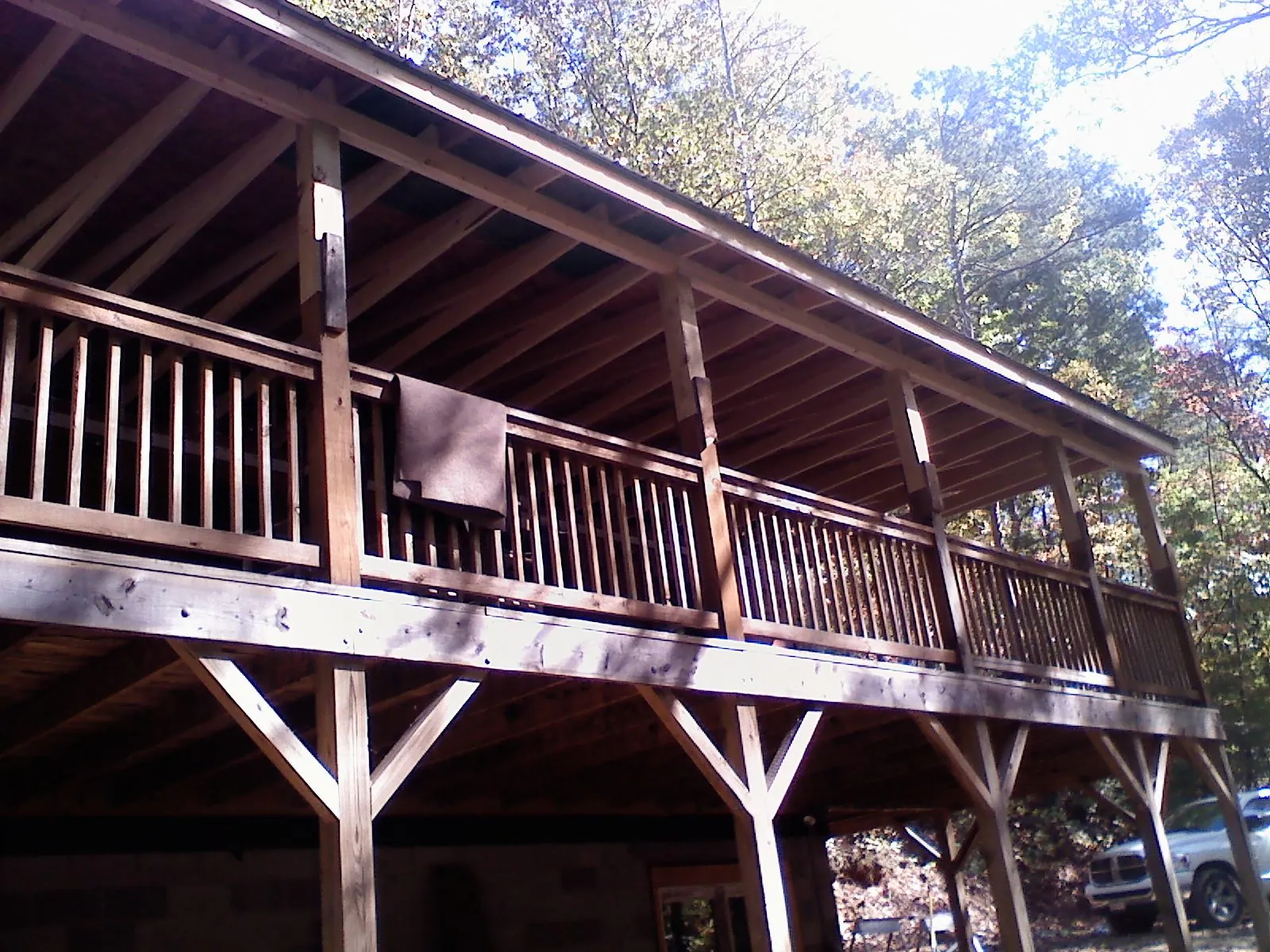Timber framing under a new elevated porch and deck — Roof Leak Repair in Rothsay by Roofing Brothers